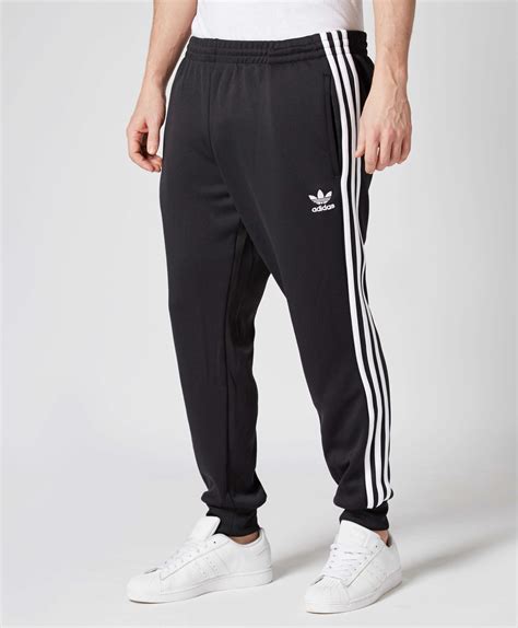 adidas original superstar pants men xs|More.